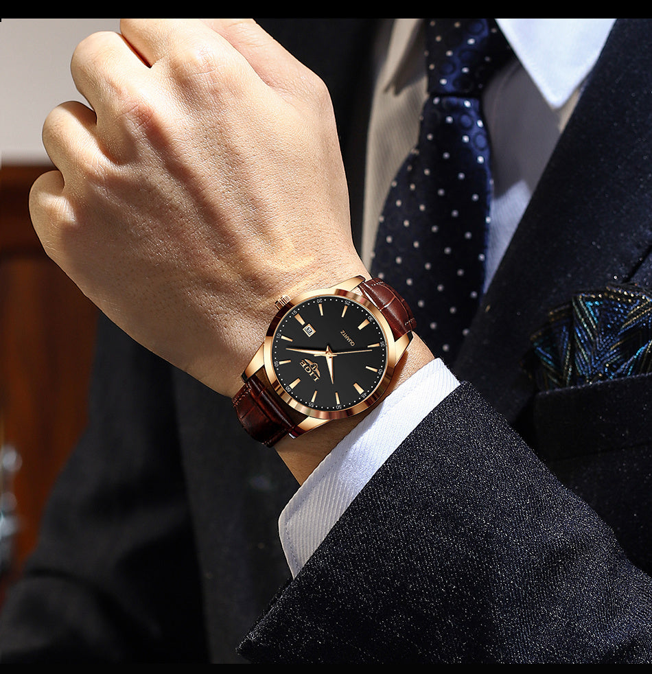 Hermoso reloj de cuarzo para hombre con correa de piel sintética. Ideal para negocio y ocasiones formales.